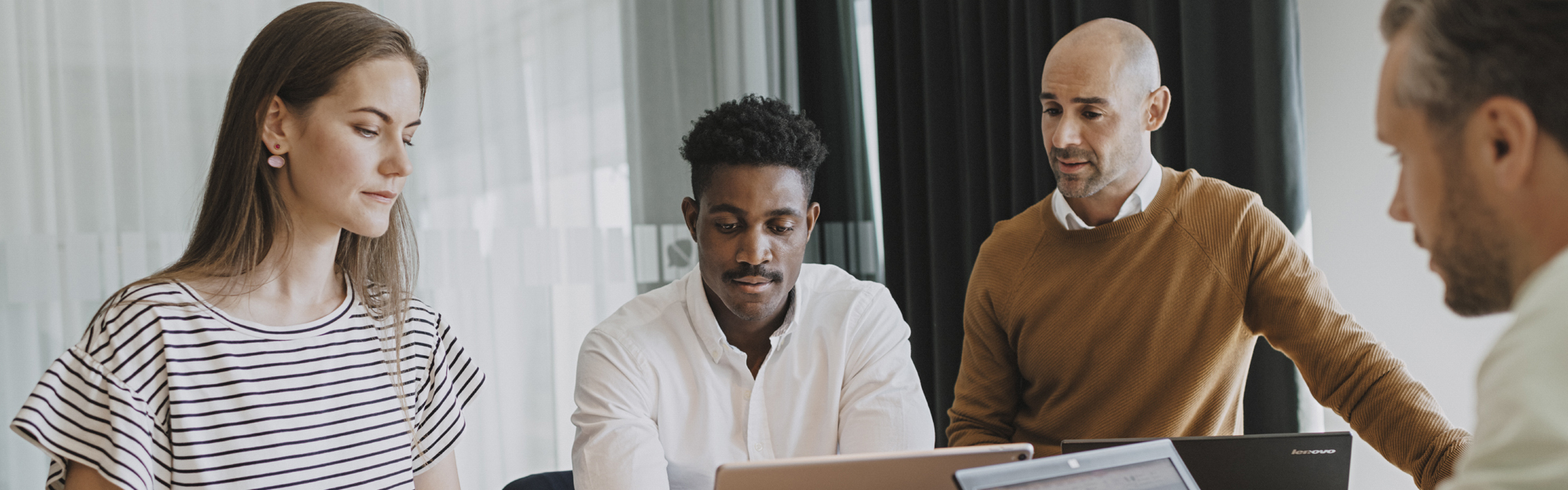 Colleagues looking at a computer